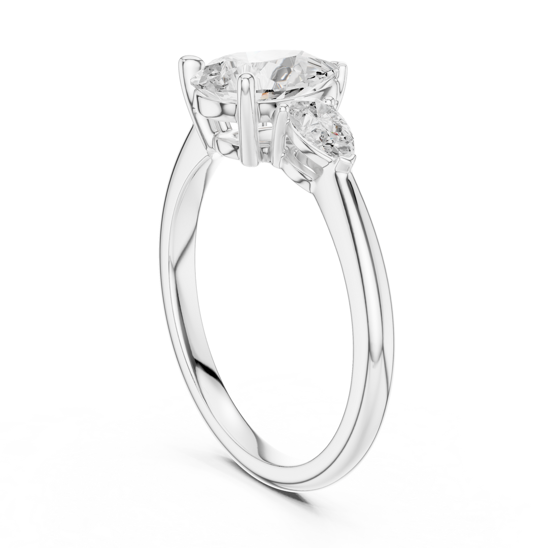 Cascade Pear Three-Stone Diamond Ring